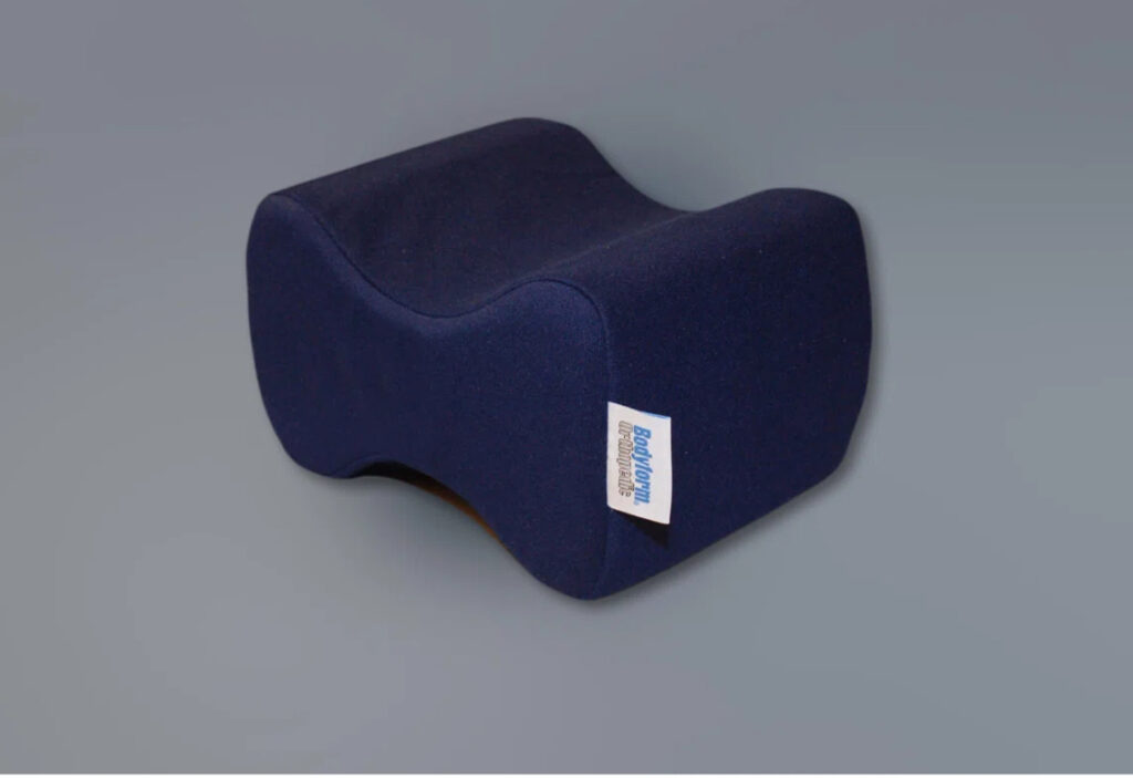 Oreiller ergonomique bleu foncé pour jambes